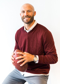 Former professional football player Reed Doughty hears better in any situation with Signia’s Pure Charge&Go X hearing aids.